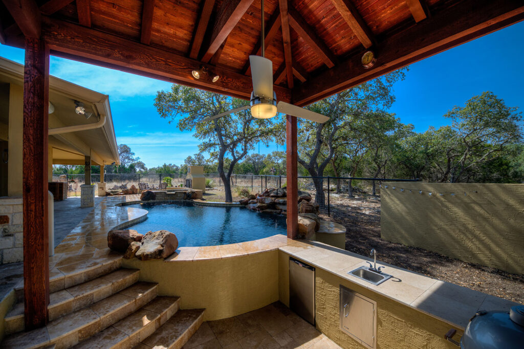 A sunken kitchen in this custom freeform pool.